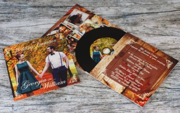 Four page wedding invitation CD wallets with black vinyl discs