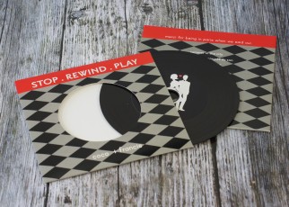 Wedding invite CDs in record-style wallets with black vinyl discs