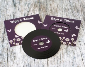 Wedding invite CDs in record-style wallets with black vinyl discs
