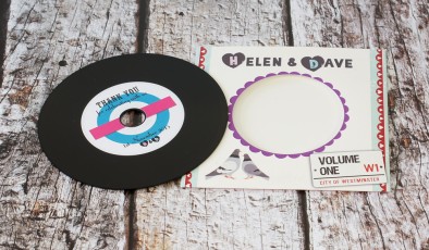 Wedding favour CDs in record-style wallets with black vinyl discs