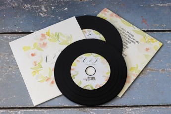 Wedding CDs in recycled card wallets