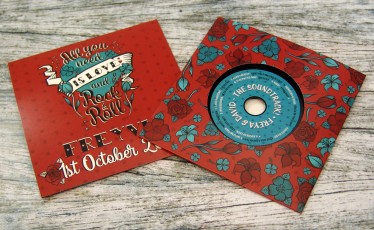 Wedding favour CDs in printed record-style wallets with black vinyl discs