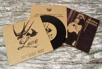 Wedding CD wallets printed on brown Manila card with black vinyl-style CDs. With a 2 page brown Manila card insert and brown parcel paper labels on the discs.